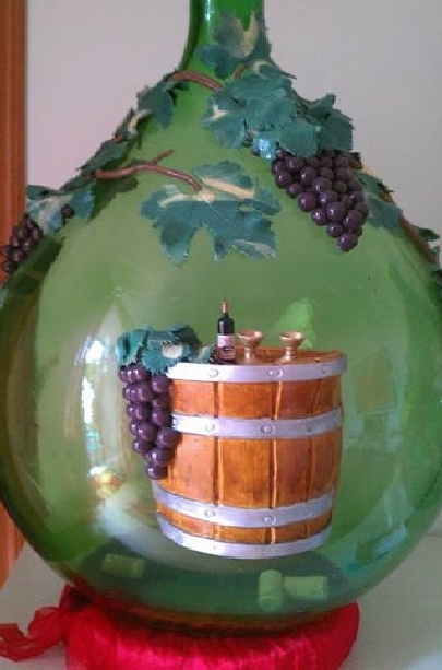 Coccinellaarte-damigiana-54litri-uva-botte