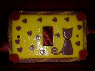 Coccinellaarte-placca-gialla-gatto-cuori